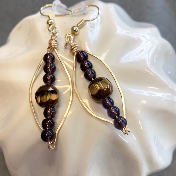 Hand Crafted Jewelry - Leaf shaped gold and purple bead earrings.